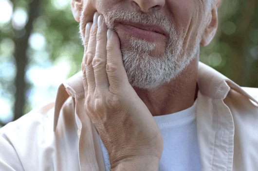 Man in Pontefract holding mouth - DIY dentistry