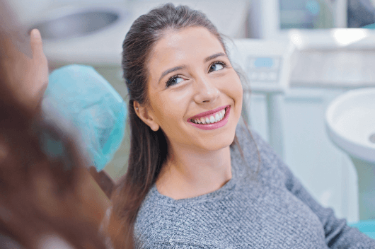 Woman with enlighten teeth whitening in Pontefract