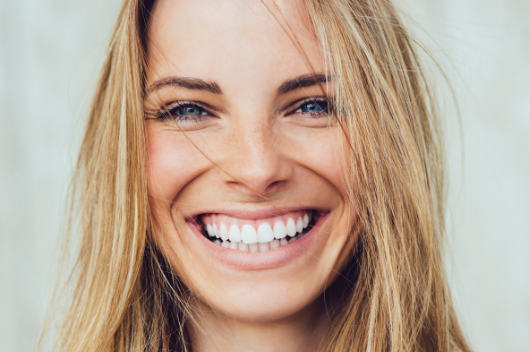 Women looking into the camera smiling | Ropergate Dental Practice Pontefract