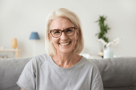 woman with dental implants smiling in pontefract