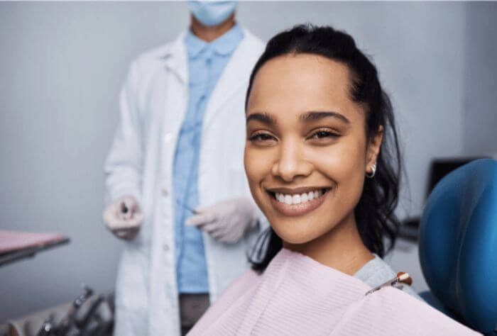 a patient smiling at Ropergate Dental after Dental implants