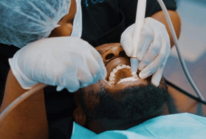 a man during a composite bonding consultation