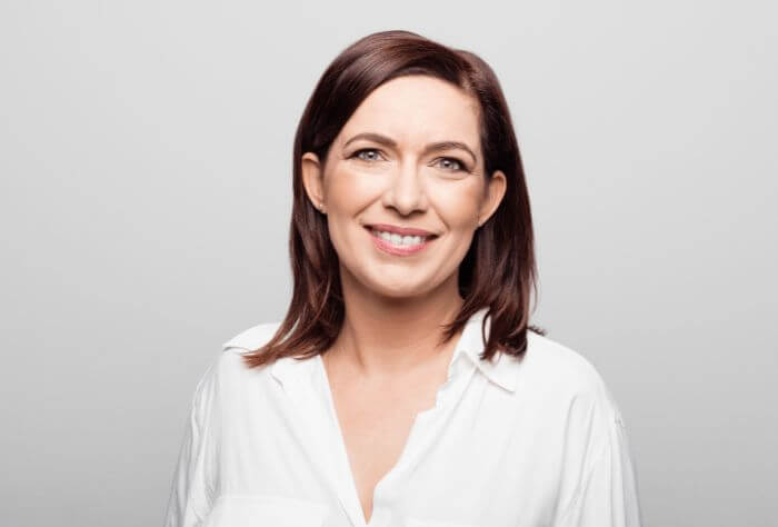 Woman smiling after getting dental implants at Ropergate Dental, Pontefract